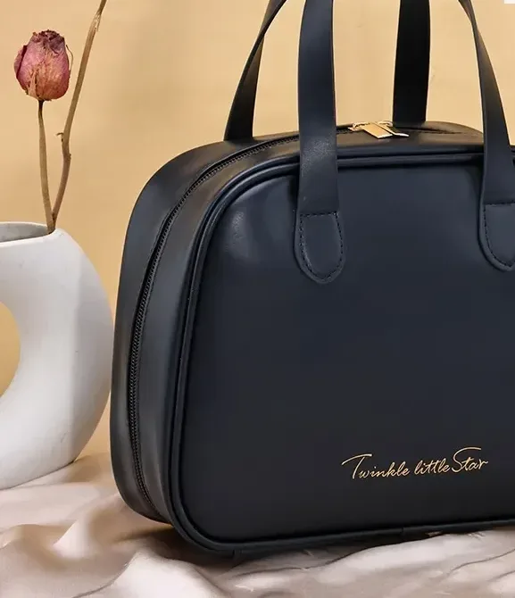 Half-moon cosmetic bag